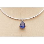 A TANZANITE AND DIAMOND PENDANT NECKLACE