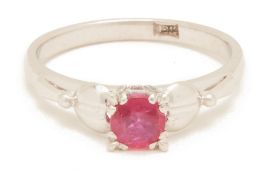 A RUBY SOLITAIRE RING