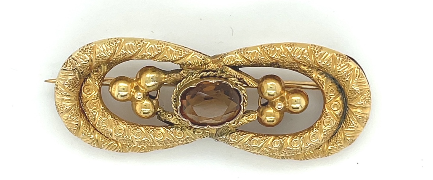 Yellow Metal (tests as gold) Brooch with central stone - 45mm x 18mm - 4.8 grams.