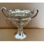 An Edwardian Arts and Crafts Silver Twin Handled Cup, George Nathan & Ridley Hayes, Chester 1907.
