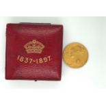 Boxed Queen Victoria Jubilee 1837-1897 Gold Coin - 25.5mm diameter and 12.71 grams.