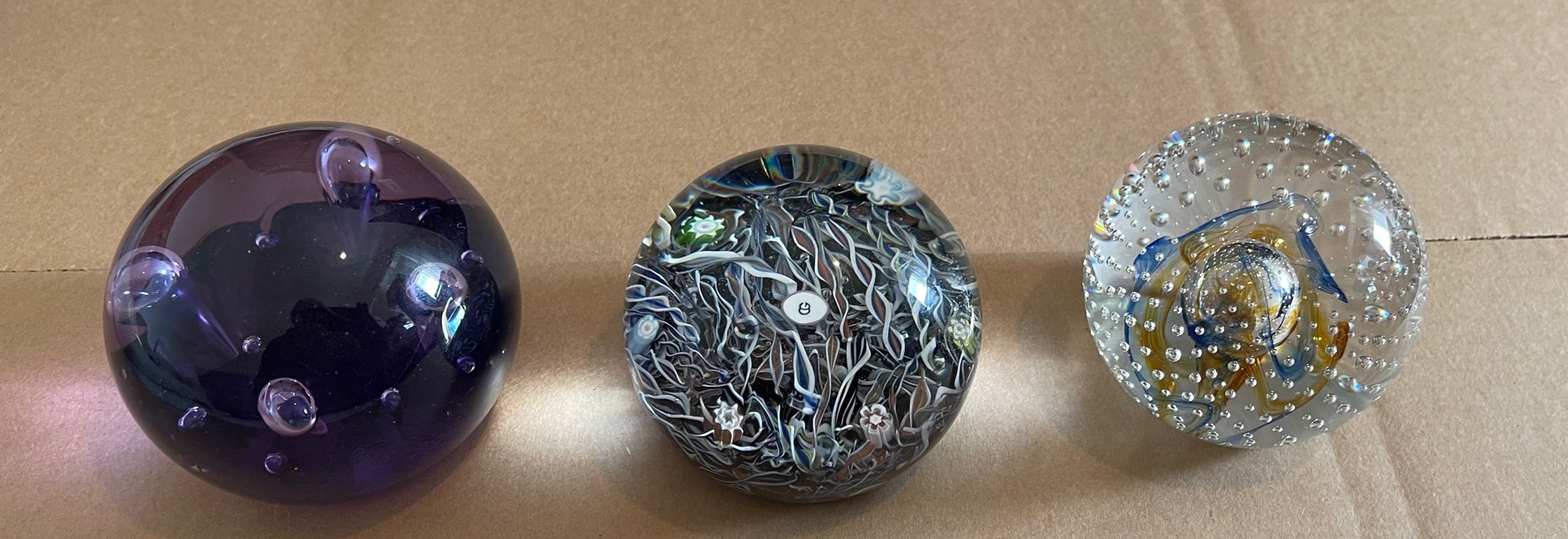 Lot of 2 x Caithness Glass Paperweights plus one other - approx 75mm x 65mm each.