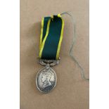 Territorial Efficiency Medal to a: 7597647 CFN. A.TAYLOR. REME.