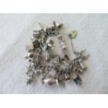 Vintage Heavy Silver Charm Bracelet - 28 Charms - Sputnik-Plane-Lighthouse etc 154 grams.