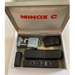 Vintage Boxed Black Minox C with accessories.