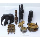 African tourist carvings, a wooden yo-yo, wooden fishing reel, etc., (no name on the reel)