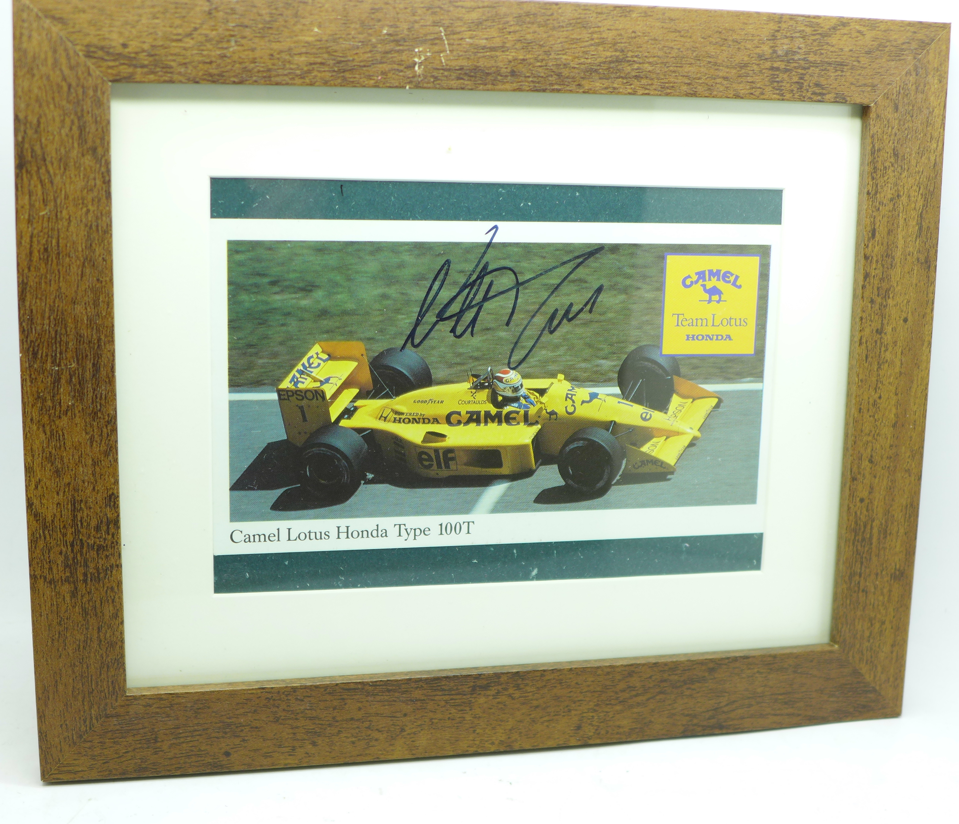 A framed and signed picture of triple world champion Nelson Piquet