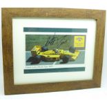 A framed and signed picture of triple world champion Nelson Piquet