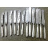 Twelve 800 silver handled knives the blades marked Solingen (6+6)