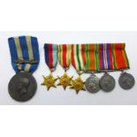 A set of six miniature medals and an Italian medal marked Africa Orientale with bar