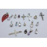 Eighteen silver pendants including stone set, crosses and a crucifix