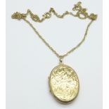 A 9ct gold locket and chain, 5.3g, chain, 47cm