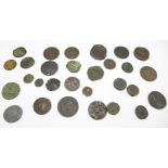 A collection of coins and tokens including three half-penny tokens, Wainfleet, Anglesey and