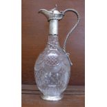 A Victorian silver mounted cut and etched glass claret jug with rope decoration, by Hirons, Plante &