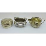 A Victorian silver jug, Birmingham 1890, Nathan & Hayes, a Victorian silver salt and an Edwardian