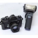 A Chinon CE Memotron camera body with Chinon 55mm f1.7 lens, Chinon 100CB flash and camera case