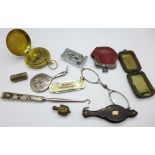 A silver handled button hook inlaid with a harp and shamrocks, a small silver backed mirror, a/f,