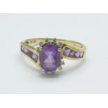 A 9ct gold, amethyst and diamond ring, 2.8g, S