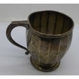 A silver christening mug, Birmingham 1928, William Suckling Ltd., 128g, a/f