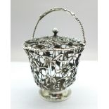 A silver swing handle cream pail with hinged lid, William Comyns, London 1902, 148g, no liner