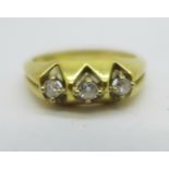 An 18ct gold, three stone diamond ring, 4g, I
