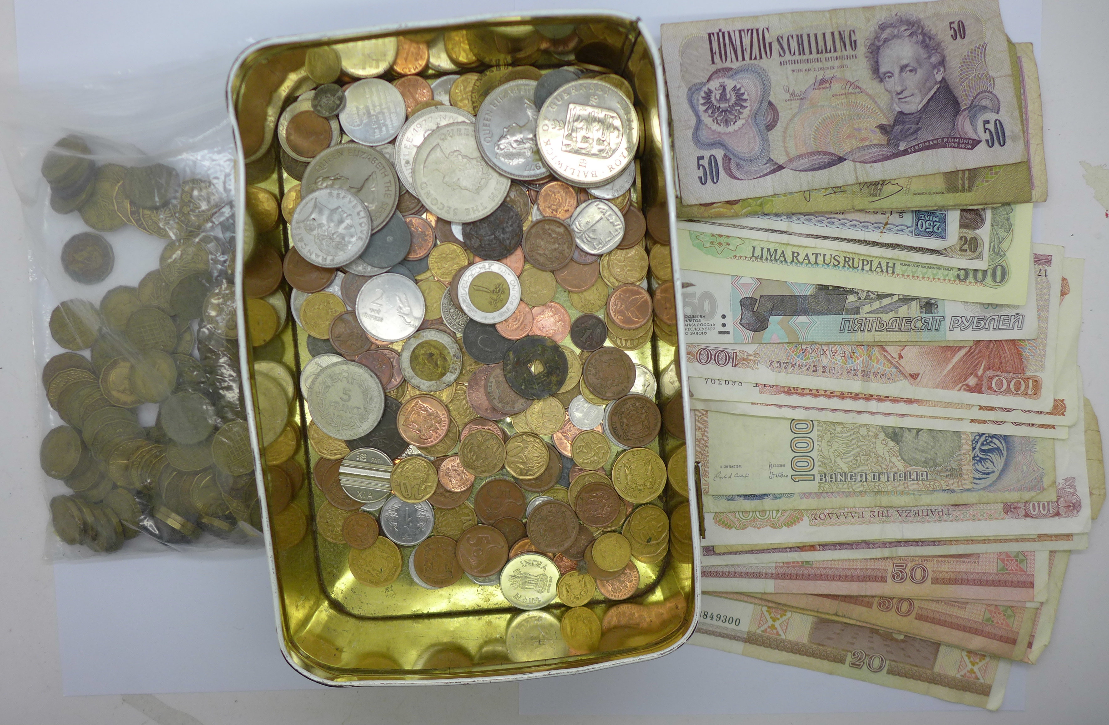 A collection of brass 3d coins, crowns, other coins and banknotes