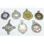 Seven fobs including two silver, St. John's Ambulance 1917 and a silver shield 1922, gold front a/f