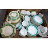 An Edwardian tea set, twelve setting, lacking one cup, one tea plate repaired and two cups a/f and