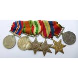 A set of six WWII medals including Africa Service Medal to C166713 N. Hutton