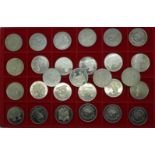 Twenty-eight one dollar coins, mainly Liberia