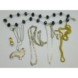 Two silver chains, a silver mounted bead necklace, Swarovski pendant and chain and a Collie dog