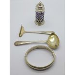 A silver spoon and pusher, a silver bangle and a silver pepper with liner, silver weight 62g