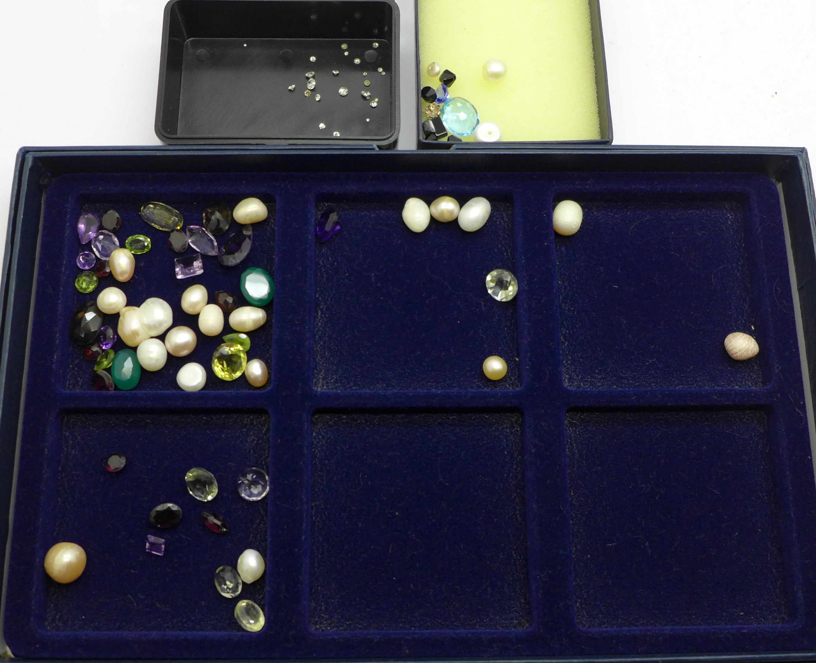 A collection gemstones, diamonds and pearls for remounting and repairs