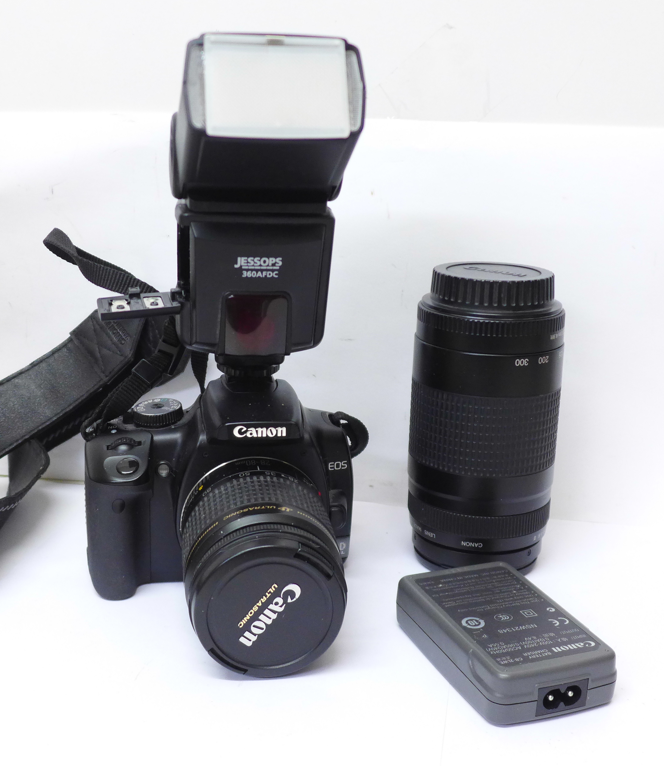 A Canon EOS 400D camera, a Canon 75-300mm f4.0-5.6 II and Canon 28-80mm f3.5-5.6 III Ultrasonic zoom