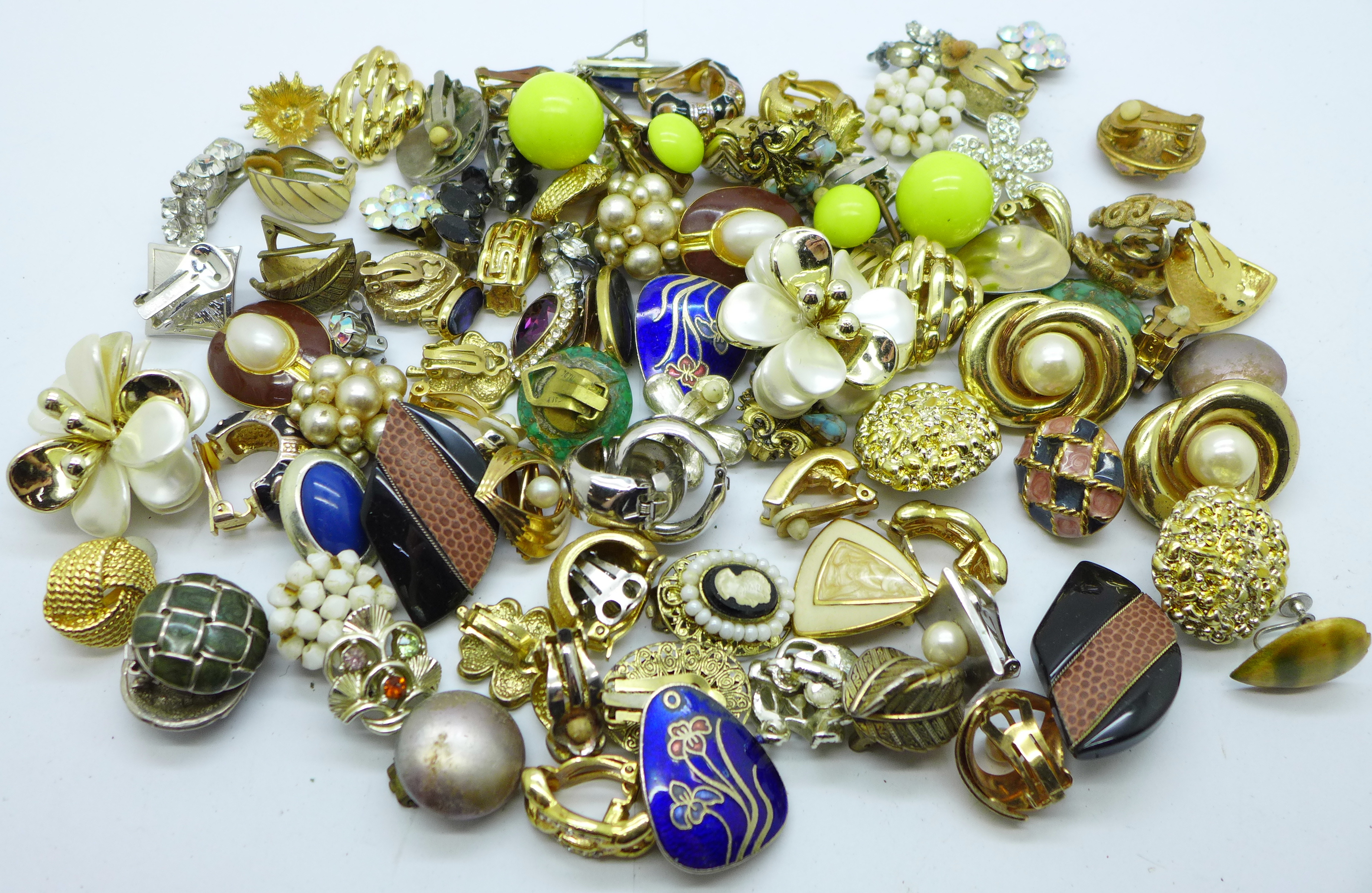 Forty-eight pairs of vintage clip-on earrings