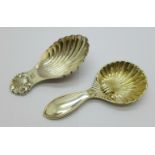 A hallmarked silver shell shaped caddy spoon, 21g, and one other plated caddy spoon