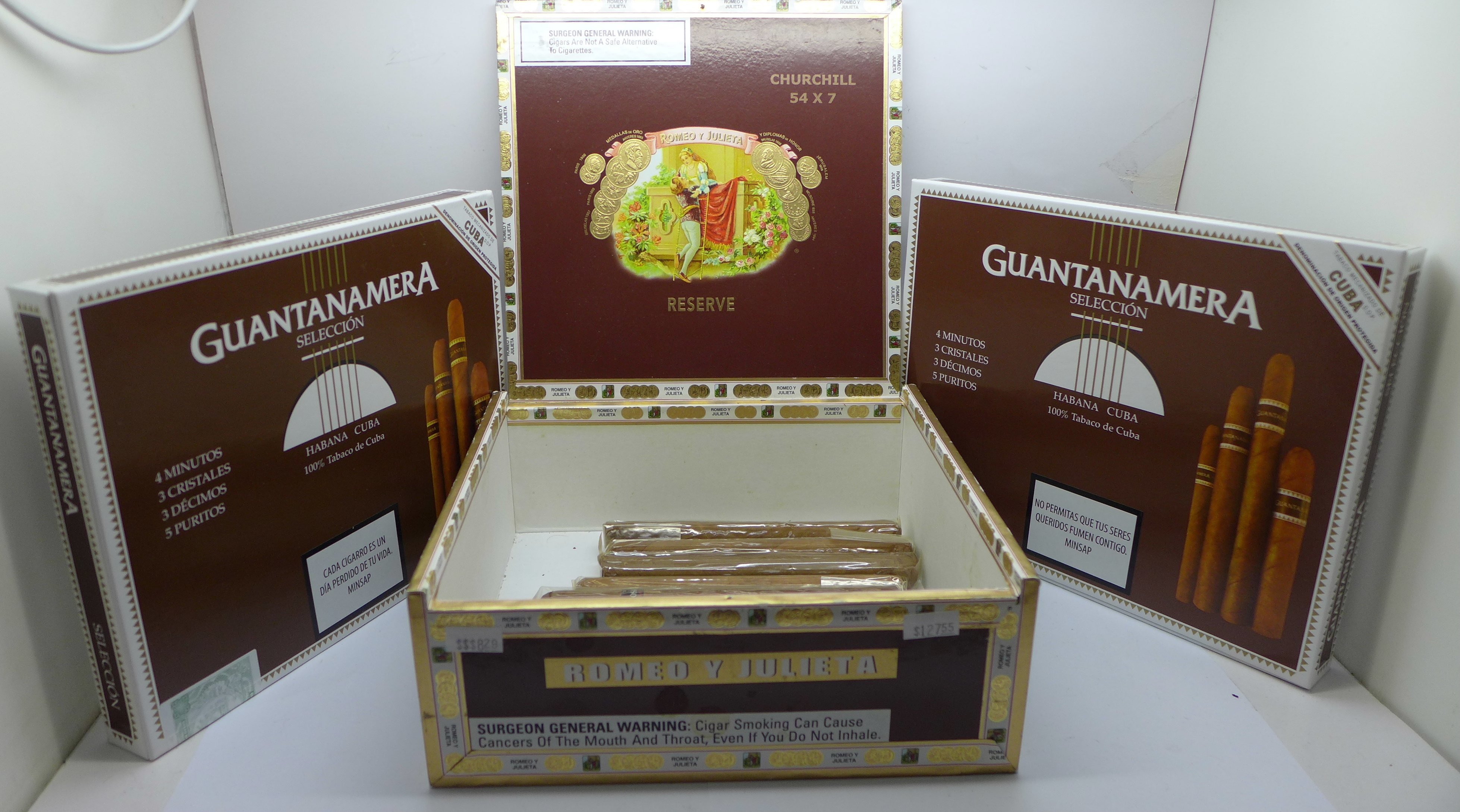 Two sealed boxes of Guantanamera Habana Cuba cigars and eight mixed size cigars in a Romeo y Julieta