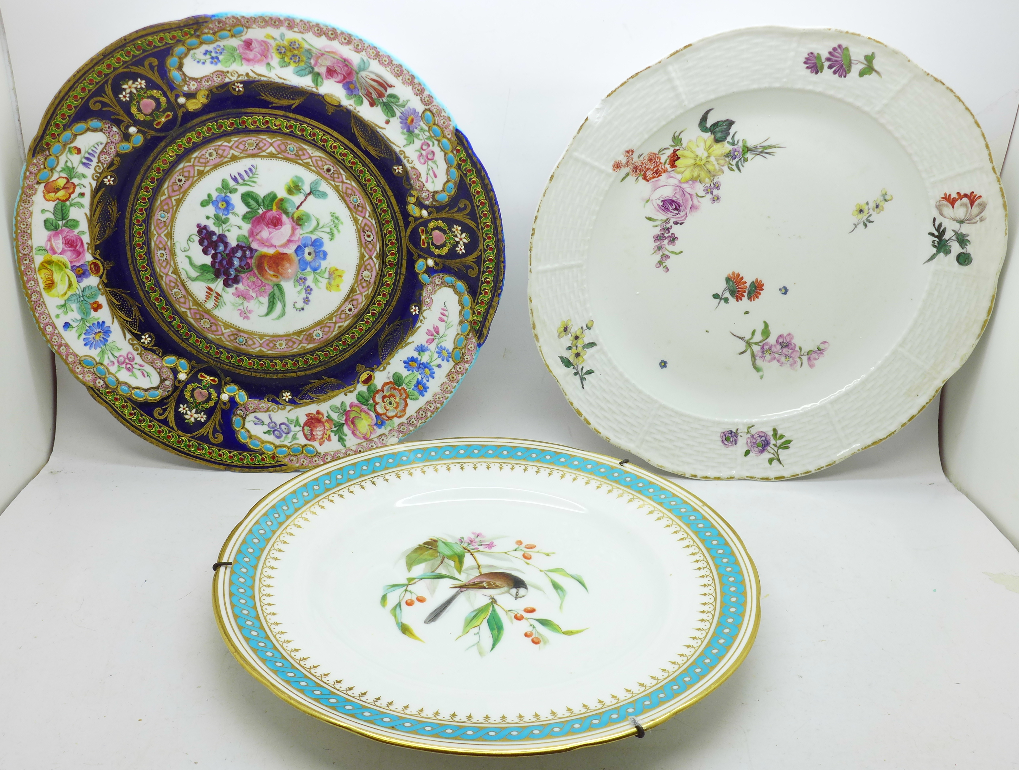 Three cabinet plates, Sevres, (cracked through the centre), Meissen, (chipped on the rim and