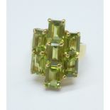 A silver gilt and peridot cluster ring, O