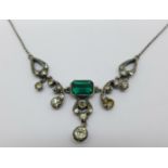 An Art Deco green and white stone necklet, lacking two stones