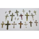 A collection of cross pendants