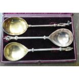 A pair of Apostle spoons, with case, incomplete, and one other spoon with figural finial