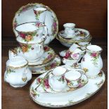 A collection of Royal Albert Old Country Roses china including two cups and saucers, bowl, vase,