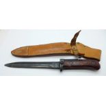 A Czechoslovakian VZ58 bayonet and leather scabbard