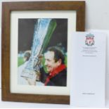 A framed signed photograph of Gerard Houllier with UEFA Cup