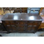 A dark elm dresser