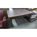 A Victorian stained pine kitchen table