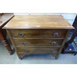 An oak chest of drawers