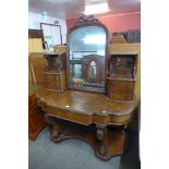 A Victorian figured walnut dressing table