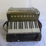 A Geraldo accordion and case a/f